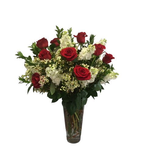 1 Dozen Red Primavera Roses with Stock, Wax and Ruscus